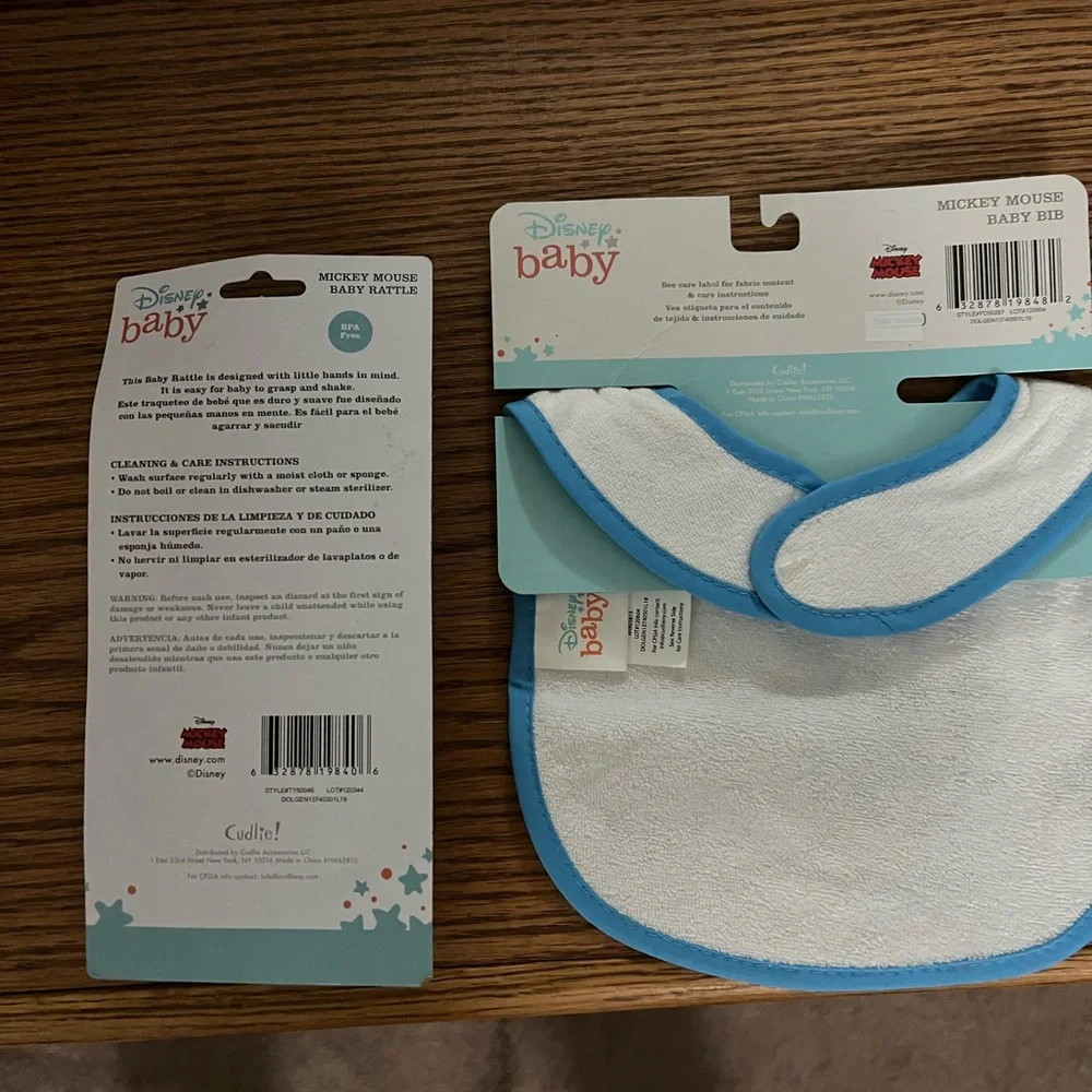 NEW Disney baby blue/white Mickey Mouse bib and bpa free rattle